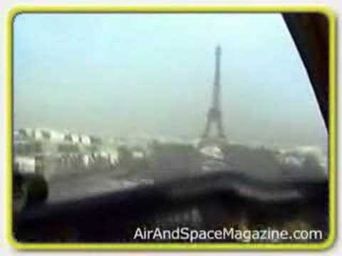 Bonanza Plane goes under Eiffel Tower